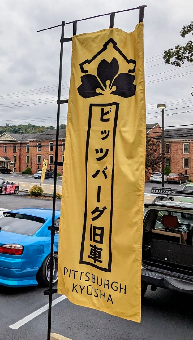 Pittsburgh Kyusha banner at a meet